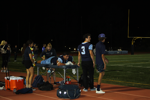 Saugus Sports Medicine attends to Brandon Lee during a home game against Santa Barbara