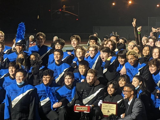 The band after getting 6th place with drum majors Zag palop, Benjamin Bartel, and Band director Bob Grigas.