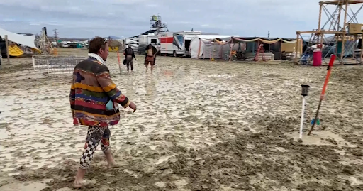 Photo Courtesy of https://www.nbcnews.com/video/burning-man-attendees-advised-to-shelter-in-place-after-rain-and-mud-192180805564 
