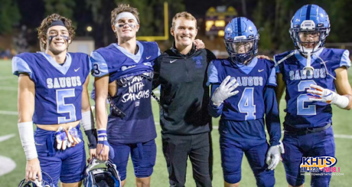 Saugus Football Players with Coach Maxwell. Photo from KHTS Radio
